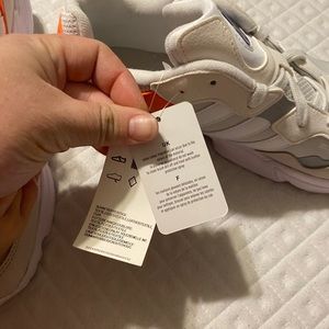 Men’s Orange white and khaki adidas. Brand new